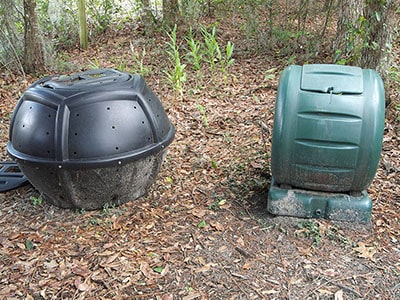 compost tumbling bins in the garden